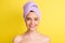 Close-up portrait of lovely cheerful girl wearing turban on head fresh soft skin healthy pore isolated over bright