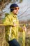 Close-up portrait of a man adjusting slacklining equipment before performing crazy slacklining tricks and walking on