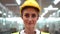 Close up Portrait of manual woman worker is wearing yellow safety helmet and wearing suit green reflective safety dress in high