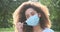 Close up portrait modern dark skin lady posing in medical face mask air pollution viral infection