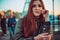 Close up portrait natural redhead girl. Thick straight long red hair. Unusual beauty. Freckled skin face. Ginger freckles.