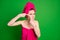 Close-up portrait of nice outraged fury mad irritated lady wearing turban removing pimple isolated on vivid green color