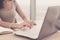 Close-up portrait of an office worker browsing, searching and analyzing new business ideas, surfing the internet at her