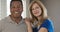 Close up portrait of older African American Husband and Caucasian wife at home