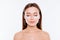 Close up portrait of pretty, charming, attractive girl with naked shoulders using, having, applying patches under close eyes, fig