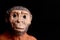 Close up portrait of a primitive man doll