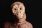 Close up portrait of a primitive man doll