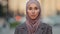 Close up portrait sad upset female face pensive serious muslim business woman young islamic girl arabian lady wearing