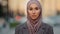 Close up portrait sad upset female face pensive serious muslim business woman young islamic girl ethnic lady wearing