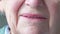 Close up portrait of an senior woman`s mouth