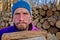 Close-up portrait of a serious lumberjack man.