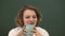 Close up portrait of smiling secretary business woman with cup.