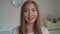 Close up portrait of smiling woman with tooth braces. Happy young woman with braces smiles in the background of dental