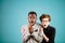 Close up portrait of two young people watching horror film