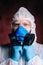 Close-up portrait of virologist medical worker wearing protective suit.