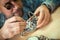 Close up portrait of a watchmaker at work