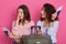 Close up portrait of woman being late for plane or confuses date of flight, sit near their suitcase, holds tickets and pasports in