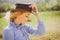 Close-up portrait of woman in the orchard looking at camera. Summer farming. Female Worker agriculture. Eco living