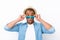 Close up portrait of young afro american shocked tourist , holding his eyewear, wearing tourist`s outfit, hat, with wide open eyes