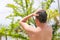 Close up portrait of a young attractive man having a shower in a