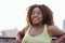 Close-up of portrait of young curvy attractive African. Charming dark skinned girl in yellow