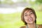 Close up portrait of young happy and beautiful expressive Asian woman laughing excited and nice in positive face expression