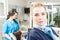 Close-up portrait of young orthodontist in dental clinic