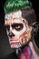 Close up portrait of zombie makeup on mans face.