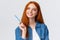 Close-up portrant attractive talented redhead girl got inspired want draw something, holding colored pencil, studying