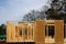 Close-up post, beam and timber framing new suburban wooden house with OSB Oriented Strand Board plywood sheathing Flowery Branch,
