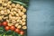 Close up of potato gnocchi with vegetarian cooking ingredients