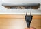 Close up power plug plugged into electric socket