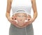 Close up of pregnant woman and headphones on tummy