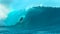 CLOSE UP: Pro surfer dude drags his hand through water while riding an epic wave