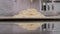 Close-up of a professional female chef laying out biscuit dough on baking paper.