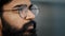Close up profile face view portrait bearded thoughtful arabian boss entrepreneur business man in glasses indoor dreaming
