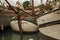 Close-up of prow and rusty anchor of a boat moored in port at Amsterdam.