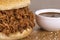 Close up on pulled pork sandwich