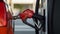 close up of pump nozzle at gas station generative AI