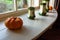 Close Up of Pumpkin and Pots in English Cottage in Countryside in front of Window