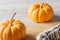 Close up of punkins for Halloween decorations on wooden background