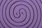 Close up Purple mosquito spiral coil.