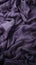 a close up of a purple silk fabric