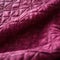 A close up of quilted magenta denim featuring its diamondpatterned texture. Trendy color of 2023 Viva Magenta.. AI