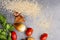 Close up of quinoa grains cherry tomato, onion and parsley