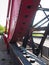 Close-up of the rack and pinion of an old rusty steel rolling lift bridge.