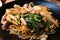 Close-up. Rad Na Noodles, crispy noodles with pork