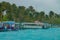 CLOSE UP: Raging tropical rainstorm passes over an idyllic port in Maldives.