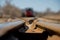 Close-up Of Railway Switch With Caboose In Background