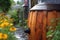 close-up of rain barrel collecting rainwater